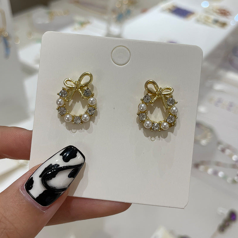 Wholesale Bow Oil Dripping Diamond Snowflake Earrings